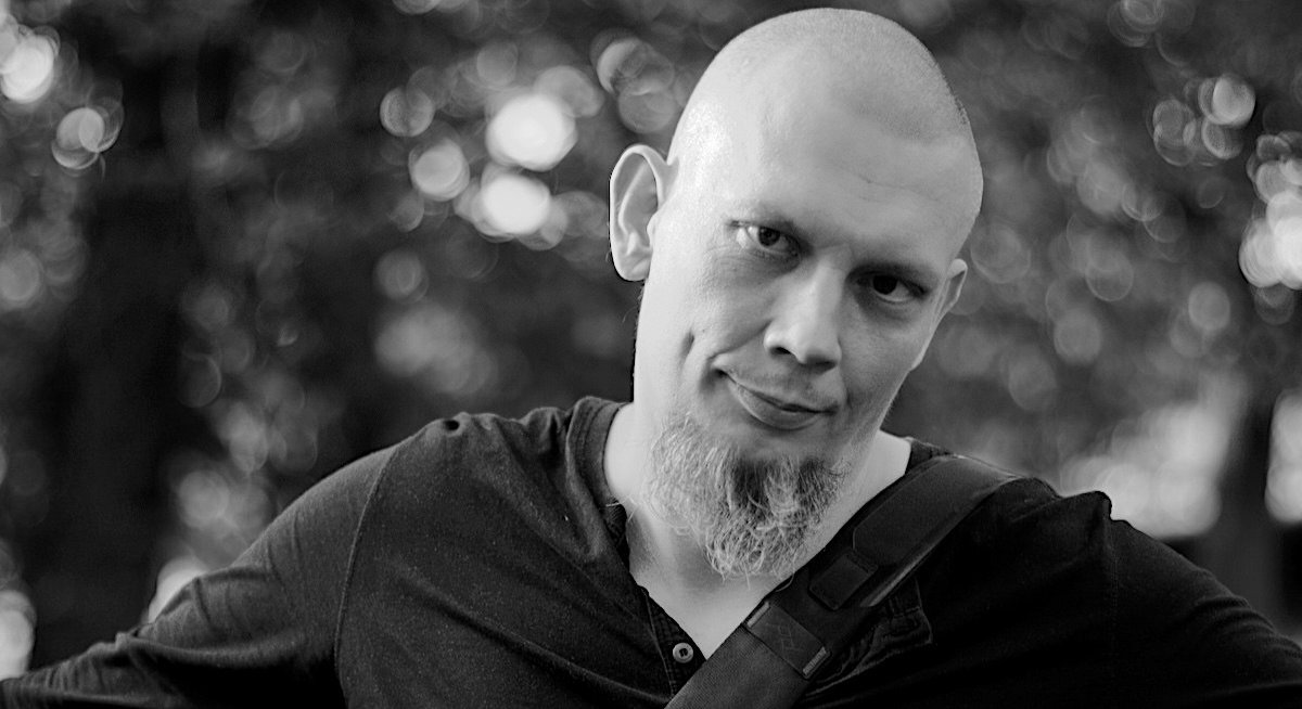 Portrait photo of Paweł Wilk, stylized